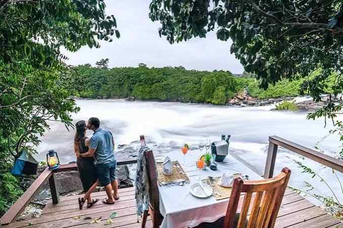 Couple enjoying a romantic Uganda honeymoon with mountain gorilla trekking and scenic Lake Bunyonyi views