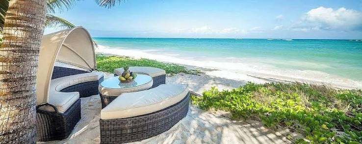 Romantic honeymoon on the Kenyan coast with a couple enjoying a sunset over the Indian Ocean in Mombasa