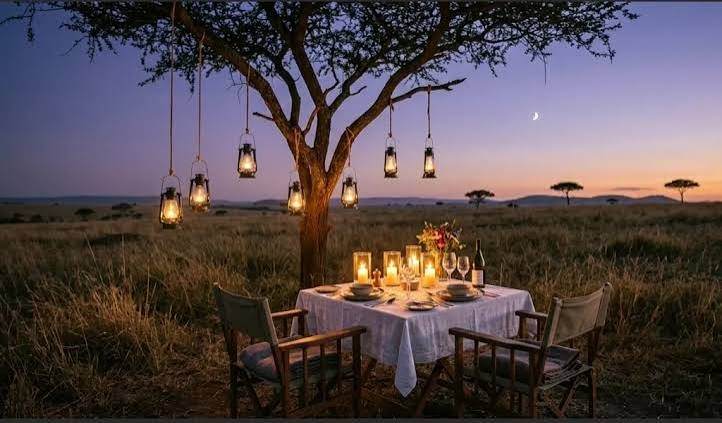 Romantic honeymoon safari in the Maasai Mara, Kenya, with a hot air balloon above the savannah