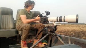 Film production crew filming wildlife in Uganda with a local fixer coordinating the shoot